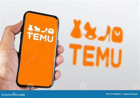 Hand Holding a Phone with Temu Logo Displayed on the Screen Editorial Stock Image - Image of ...