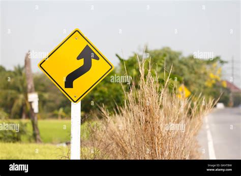 winding road sign Stock Photo - Alamy