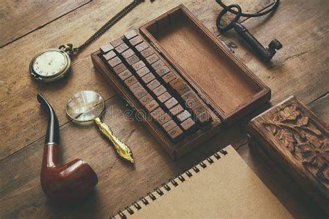 Detective Concept. Private Detective Tools: Magnifier Glass, Old Keys, Smoking Pipe, Notebook ...