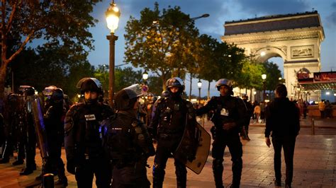 France riots: Heavy police presence at Champs-Elysees in protest clampdown | World News | Sky News