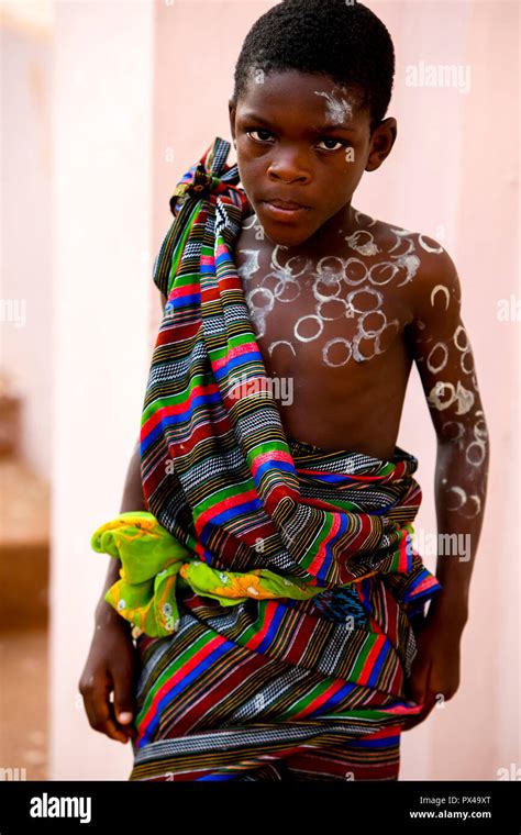 Boy in traditional costume attending a celebration for the 20th ...