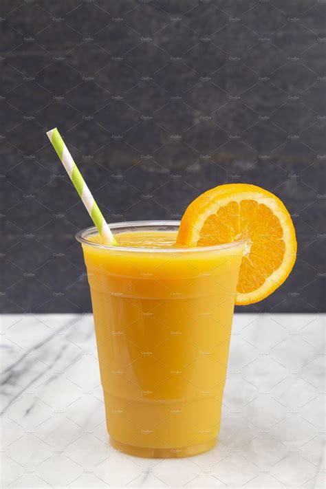 Freshly Squeezed Orange Juice | High-Quality Food Images ~ Creative Market