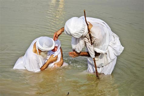 Mandaeans practicing baptism in Karun River - Tehran Times