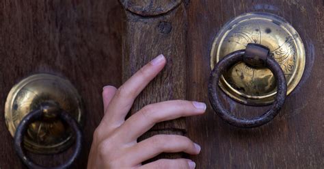 A Person Holding Brown Wooden Door · Free Stock Photo