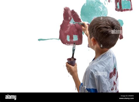 Young boy works on painting Stock Photo - Alamy