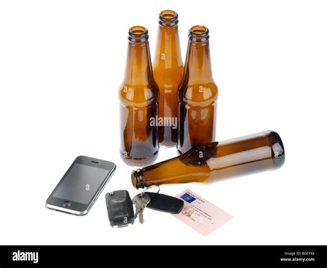 Empty Beer Bottles with Car Keys Stock Photo - Alamy