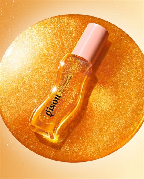 Gisou's Honey Infused Lip Oil Golden Shimmer Glow Is A Y2K Throwback