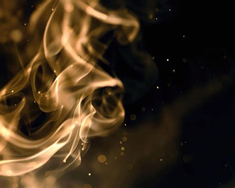 Premium Photo | Abstract gold smoke on dark free background