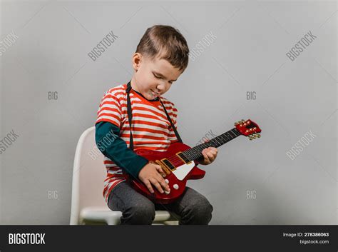 Child Playing Electric Image & Photo (Free Trial) | Bigstock