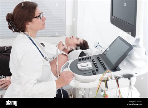 Cardiologist detecting senior female patients heart risk Stock Photo ...