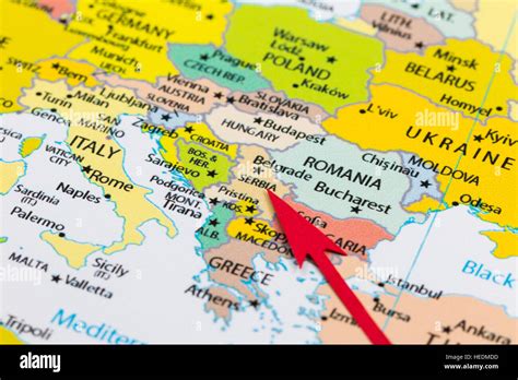 Red arrow pointing Serbia on the map of Europe continent Stock Photo - Alamy