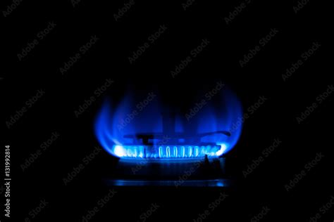 Blue flame of kitchen gas stove Stock Photo | Adobe Stock