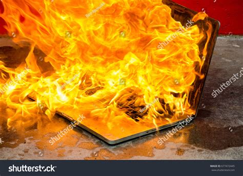 Laptop Computer Exploding Into Flames Burning Stock Photo 677472445 | Shutterstock