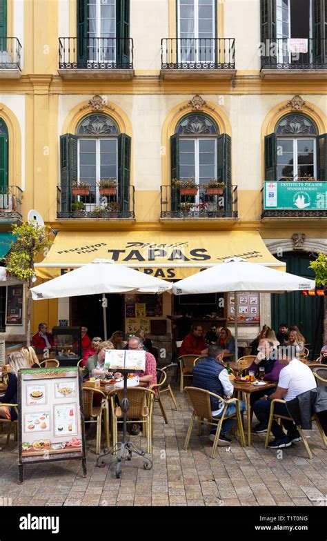 Malaga Tapas restaurant - people eating at a Tapas bar, Plaza de la ...