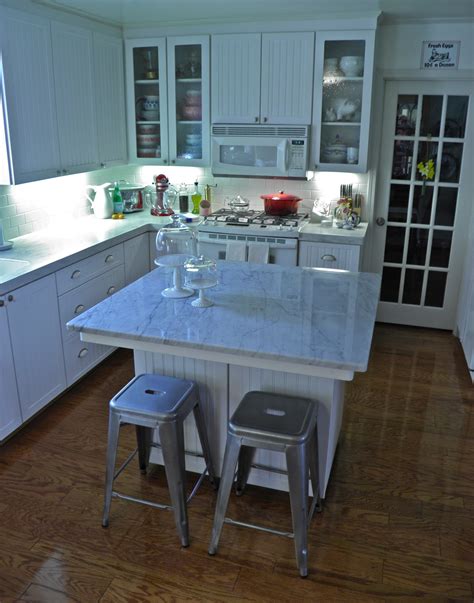 The Granite Gurus: An Interview with a Carrara Marble Kitchen Owner