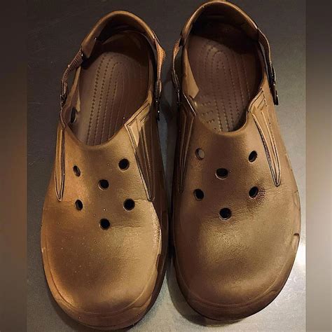 Brown CROCS with a neat, flexible strap design that... - Depop