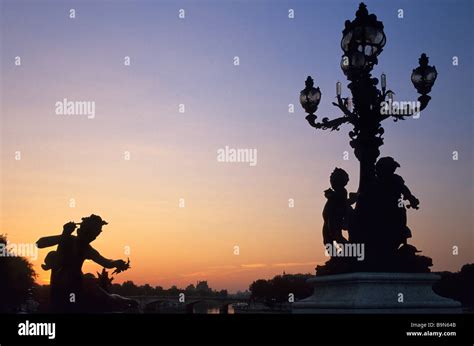 France, Paris, Pont Alexandre III, sunset on the lampposts Stock Photo ...