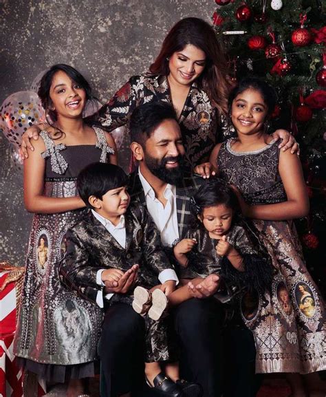 Vishnu Manchu and family in victorian themed black outfits for christmas!