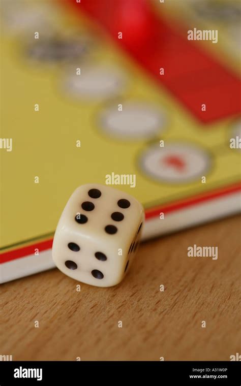 Dice and board game Stock Photo - Alamy