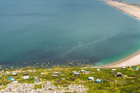 Chesil Beach with Beach Huts Stock Image - Image of dramatic ...