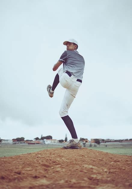 Premium Photo | Man baseball and pitcher in sports throw or competitive ...