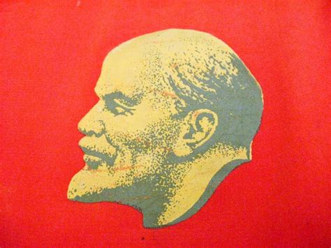 Premium Photo | The image of lenin on the red background