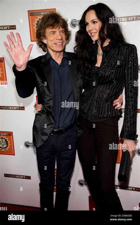 SuperHeavy member Mick Jagger and his girlfriend L'Wren Scott attend the release party for the ...