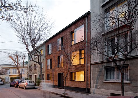 MAPA updates Chilean housing block with textured brick facade