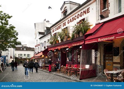 A Street and Cafes in Montmartre. Editorial Photography - Image of ...