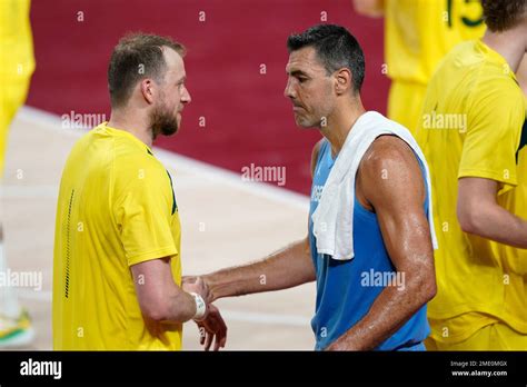 Argentina's Luis Scola greets Australia's Joe Ingles, left, at the end of a men's basketball ...