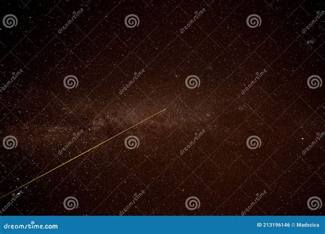 A Laser Beam Shoots into the Night Sky Stock Photo - Image of milky ...