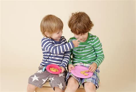 Kids Sharing A Snack, Food, Children's Fashion Stock Photo - Image of little, activity: 40974482