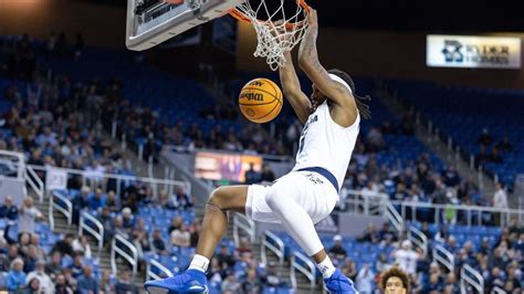 Photo gallery: Nevada basketball bumps UC Davis, Jeff Choate and baby races