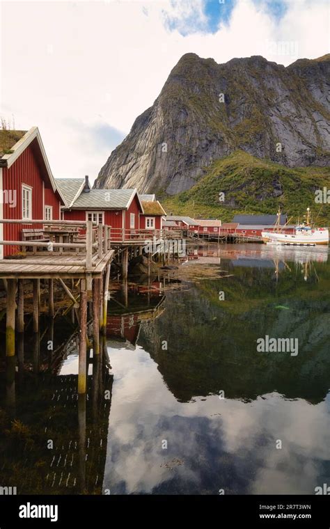 Traditional red rorbuer cabins in the fishing village of Reine, Lofoten Islands, Norway Stock ...