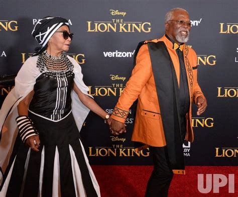 Photo: John Kani and Mandi Kani attend "The Lion King" premiere in Los Angeles - LAP2019070962 ...