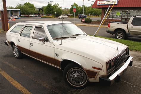 OLD PARKED CARS.: 1982 AMC Concord DL wagon.