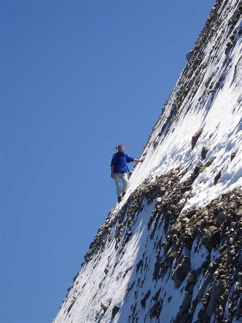 HD wallpaper: person climbing steep snow covered mountain, wanderer ...