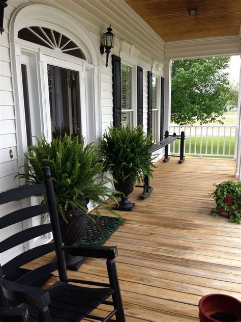 Black and white porch | Farmhouse front porch decorating, Porch design ...