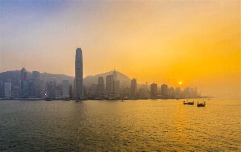 Hong Kong Central skyline and Victoria Harbour at sunset, Hong Kong ...