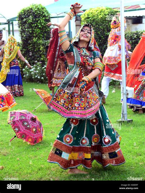 Indian girls practice the Garba dance steps in preparation for the ...