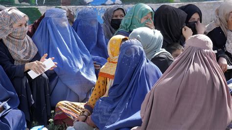 The Taliban says women in Afghanistan must wear head-to-toe clothing in ...