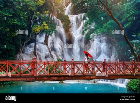 Woman walking at Kuang Si waterfall in Luang Prabang, Laos Stock Photo - Alamy