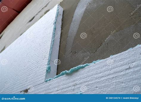 Installation of Styrofoam Insulation Sheets on House Facade Wall for ...