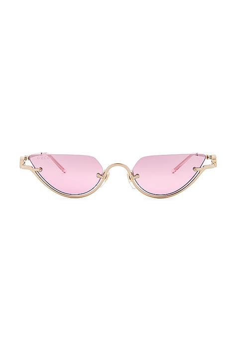 Gucci GG Upside Down Cat Eye Sunglasses in Gold | REVOLVE