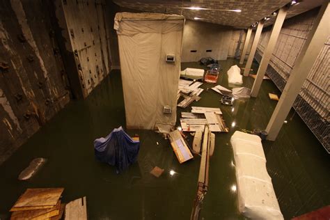 Floodwater Pours Into 9/11 Museum, Hampering Further Work on the Site - The New York Times