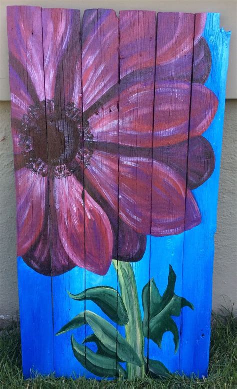 Add flowers anywhere by painting on old reclaimed fence sections. | Fence art, Whimsical garden ...