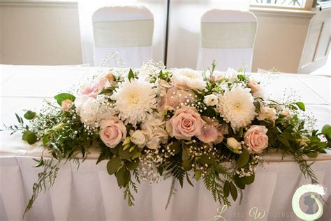 Bridal table flowers, Wedding table flowers, Ivory wedding flowers