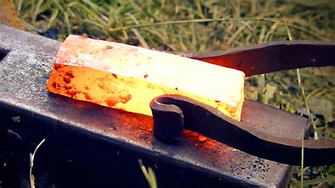 SMELTING AND FORGING BLOOMERY IRON [Trollsky Knifemaking] - YouTube