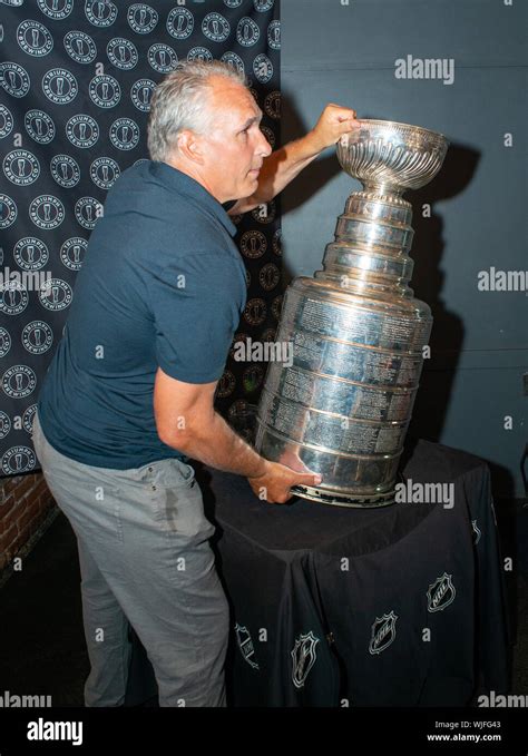 Stanley Cup Champion St. Louis Blues head coach Craig Berube carries the cup after he showed off ...