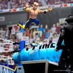 Logan Paul’s Dive on KSI in a Prime Bottle in Figure Photography – Wrestling Figure News